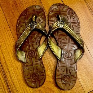 Tory Burch gold snakeskin leather flip flops size 5